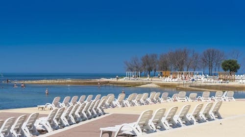 Apartmani Polynesia Plava Laguna - Odmor u Istri uz polupansion, Umag, Istra, Hrvatska - 267 EUR - 2x noćenje u Studio Economy apartmanu 2+1 strana park za 2 osobe (dijete do 4,99 godina besplatno), Polupansion (doručak i večera)